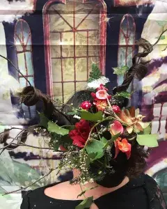 Mystérieuses coiffures : Le raccommodeur de fleurs