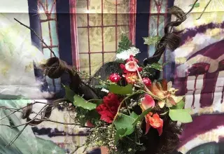 Mystérieuses coiffures : Le raccommodeur de fleurs